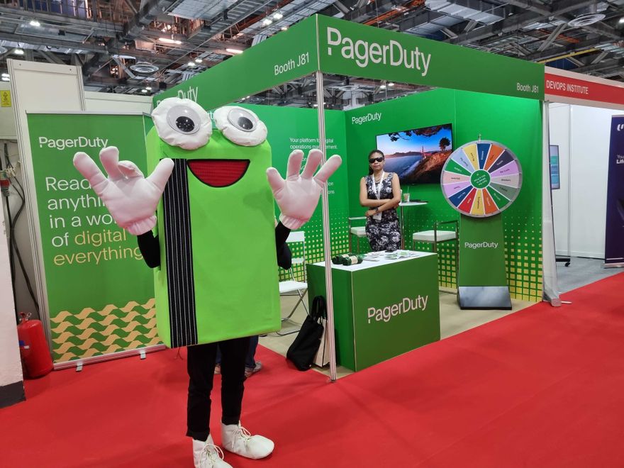 Pagey, the PagerDuty mascot, beside our vendor booth at Cloud Expo Asia.