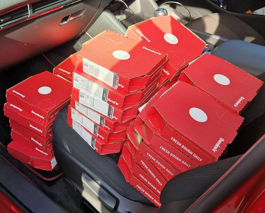 A load of personal sized pizzas